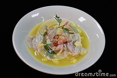 Peruvian seafood ceviche in a bowl with black background Stock Photo