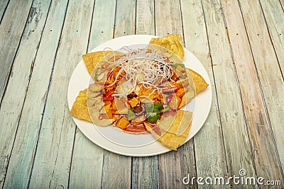 Peruvian style wantan dish with vegetables and fruits sauteed with sweet Stock Photo