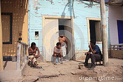 Peruvians very poor boys in front of their homes Editorial Stock Photo