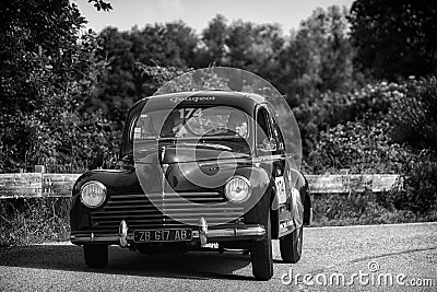 PESARO COLLE SAN BARTOLO, ITALY - MAY 17 - 2018: PEUGEOT 203 1949 old racing car in Mille Miglia rally 2018 the famous italian his Editorial Stock Photo
