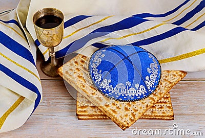 Matzo for Passover with kiddush cup of wine in the kippa Stock Photo