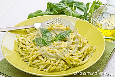 Pesto trofie typical ligurian recipe in green dish Stock Photo