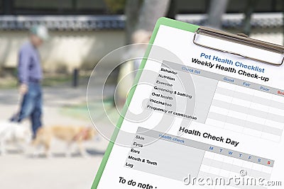 Pet health checklist on clipboard. Stock Photo