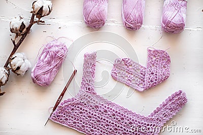 Petals purple crochet flower and wood crochet needles Stock Photo
