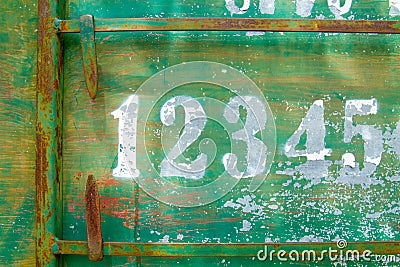 Petanque scoreboard number on green rusty metal texture plate Stock Photo