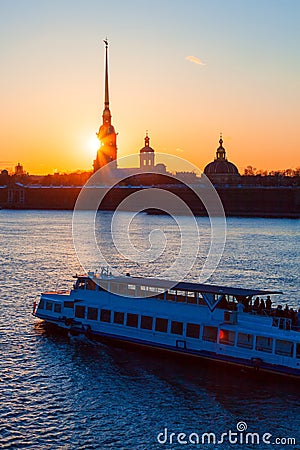 The Peter and Paul fortress and boat during the white nights Stock Photo