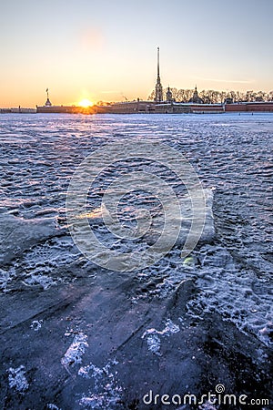 Russia, St. Petersburg, March 4, 2018: Peter and Paul Fortress at sunset. View from the frozen Neva River Editorial Stock Photo