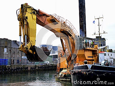 Backhoe Dredger at Harbour Project. Editorial Stock Photo