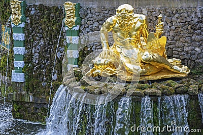 Peterhof, a fragment of the Grand Cascade, a statue symbolizing the Volkhov river Editorial Stock Photo