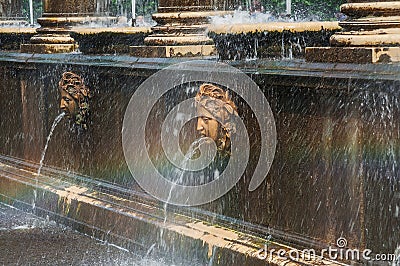 Peterhof Palace St Petersburg, Russia. Masque - detail of a fountain in Upperer Garden. The Peterhof Palace included in Editorial Stock Photo