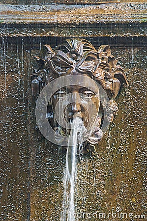Peterhof Palace St Petersburg, Russia. Masque - detail of a fountain in Upperer Garden. The Peterhof Palace included in Editorial Stock Photo