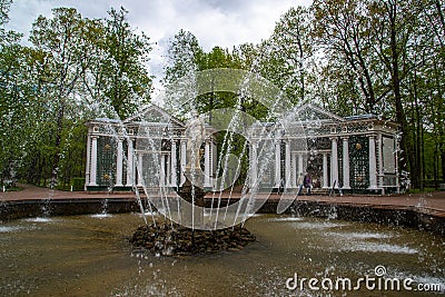 Peterhof, Russia - June 03. 2017. View of Adam statue in fountain and Draft arbor in Lower park Editorial Stock Photo