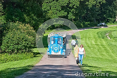Peterhof. Russia. People in excursion train in Alexandria Park Editorial Stock Photo