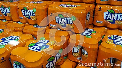 Stack of Fanta six pack Orange fizzy drink cans Editorial Stock Photo