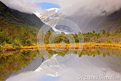 Peters Pool at the begining of the track going to Franz Josef Glacier, New Zealand. Stock Photo