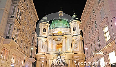 The Peterskirche St. Peters Church night view, Vienna, Austria Stock Photo