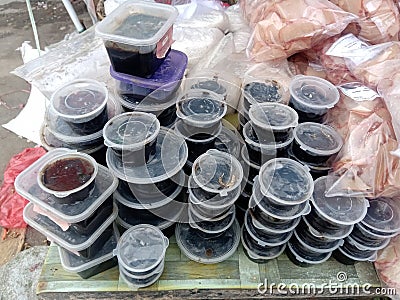 Petis at the traditional market. Used for food flavoring. Stock Photo
