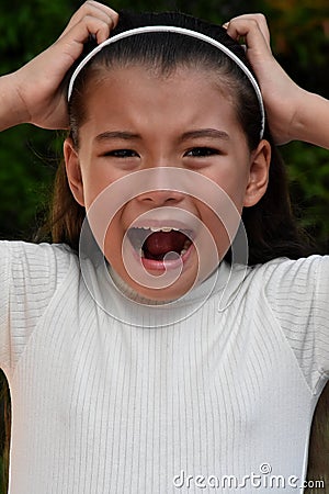 Petite Philippina Girl Under Stress Closeup Stock Photo