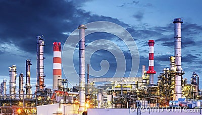 Petrochemical plant at night, oil and gas industrial Stock Photo