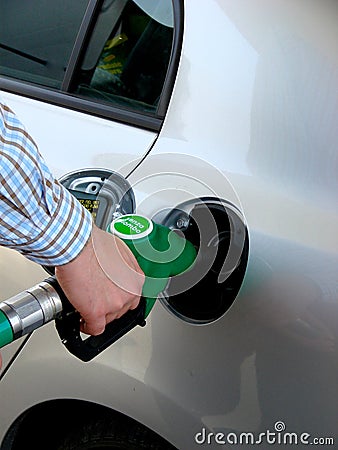 Petrol pump filling Stock Photo