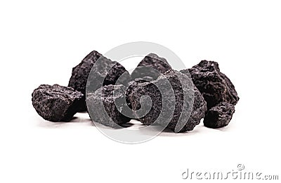 Petroleum coke is a carbonaceous granular solid product from the processing of liquid petroleum fractions, rich in carbon that Stock Photo