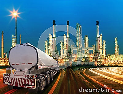 Petroleum container truck and beautiful lighting of oil refinery Stock Photo