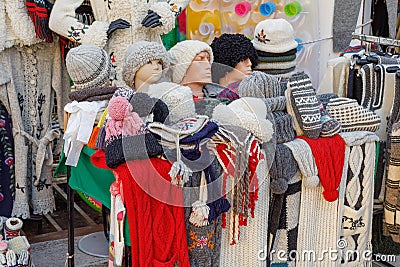 PETROVAC, MONTENEGRO - SEPTEMBER 18, 2019: Colorful knitted hats and scarfs Editorial Stock Photo