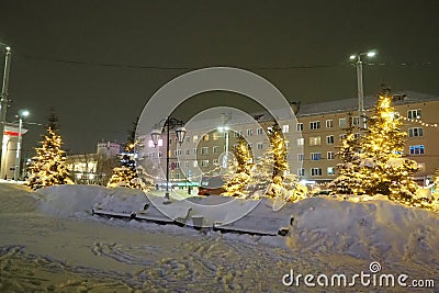 Petrozavodsk, Karelia, Russia, 01.13.2024: Gagarin Square, view of Lenin Avenue, Christmas trees. Winter evening or Editorial Stock Photo