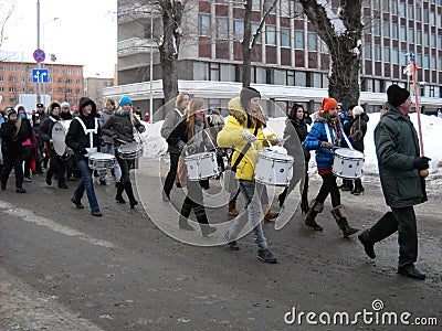 Petrozavodsk, Republic of Karelia / Russia - November 9, 2019: festive demonstration in the streets on a cold winter day. Adults Editorial Stock Photo