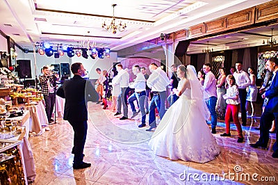 Petryky, Ukraine - May 14, 2016: Dance wedding party with guests Editorial Stock Photo