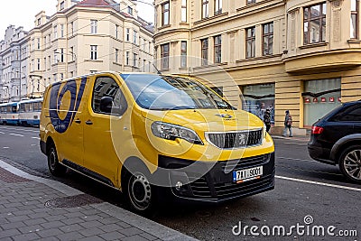 Peugeot Expert Furgon car of the Ceska Posta Czech Post Office company delivering packages in the streets of Ostrava city Editorial Stock Photo