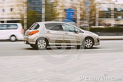 Peugeot 308 five door hatchback is driving at high speed Editorial Stock Photo