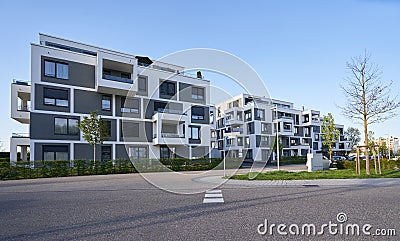 Pforzheim, Germany - April 21, 2019: Modern cube-shaped apartment building with exposed balconies in a modern European Editorial Stock Photo