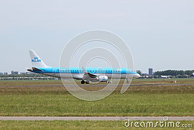 PH-EXC KLM Cityhopper Embraer ERJ-190STD Aircraft landing at the Polderbaan 36L-18R at the Amsterdam Schiphol airport in the Nethe Editorial Stock Photo