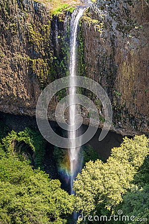 Phantom Waterfall dropping off over vertical basalt walls, North Table Mountain Ecological Reserve, Oroville, California Stock Photo