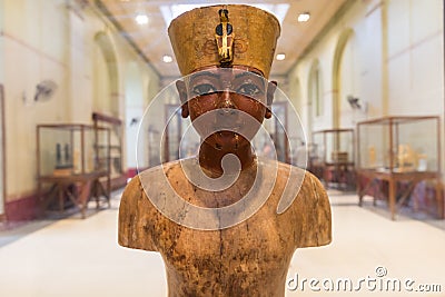 A Pharaoh statue inside of the Museum of Egyptian Antiquities, known commonly as the Egyptian Museum or Museum of Cairo, in Cairo Editorial Stock Photo