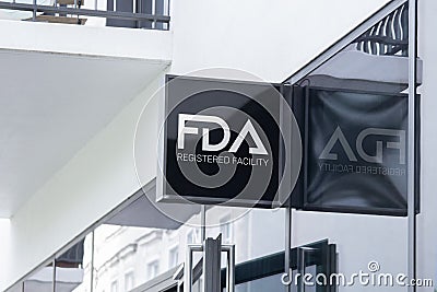 Wall of Pharma company showing on Square sign light board l FDA Registered Facility. approved Editorial Stock Photo