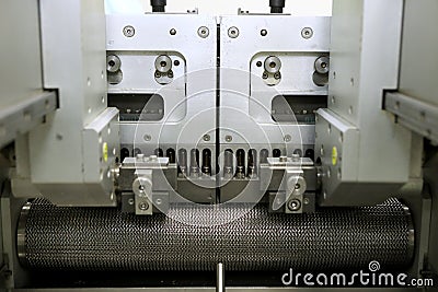 Pharmaceutical industry. Production Line. Machine conveyor with glass bottles, ampoules in a factory. Fill bottles and Stock Photo