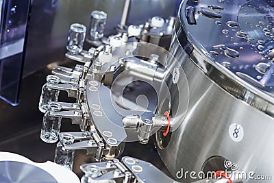 Pharmaceutical machine for powder drugs glassware bottles Stock Photo