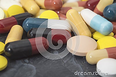 Pharmaceutical medicine pills, tablets and capsules different colors. Medicine tablets and pills Stock Photo