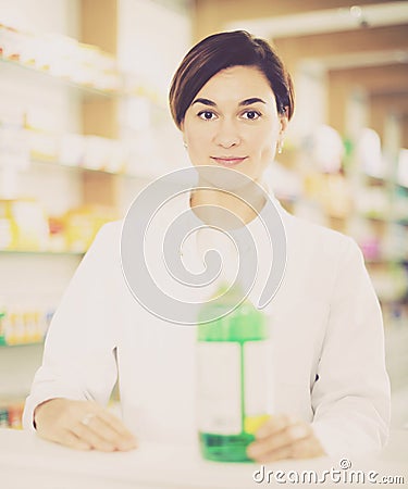 Pharmacist ready to assist in choosing at counter Stock Photo