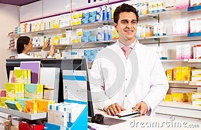 Pharmacists pharmacist at the chemists shop Stock Photo