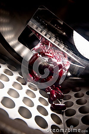 Pharmacological pills production. Inside conveyor. Stock Photo