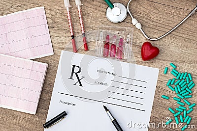 Pharmacy receipt with stethoscope, cardiogram and medication Stock Photo