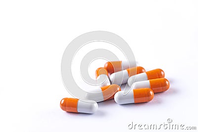 Pharmacy theme, Heap of orange white medicament Stock Photo