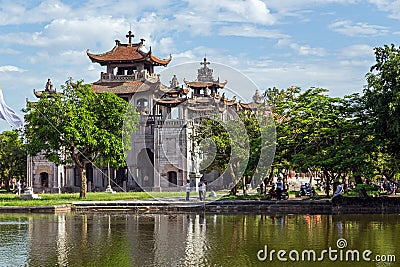 Phat Diem cathedral under blue sky in Ninh Binh, Vietnam Editorial Stock Photo