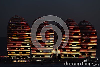 Pheonix Island Sanya, illuminated buildings. Unique modern design Stock Photo