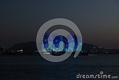 Pheonix Island Sanya, illuminated buildings. Unique modern design Stock Photo