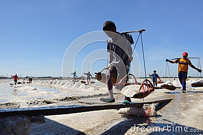 Thai salt farm worker Editorial Stock Photo