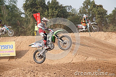 Phichit,Thailand,December 27,2015:Extreme Sport Motorcycle,The motocross competition,motocross rider jump. Editorial Stock Photo
